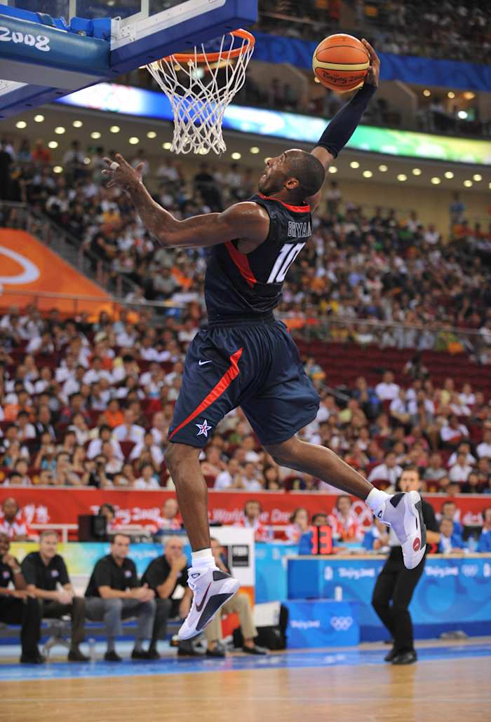 Team USA guard Kobe Bryant goes up for a dunk during a game.